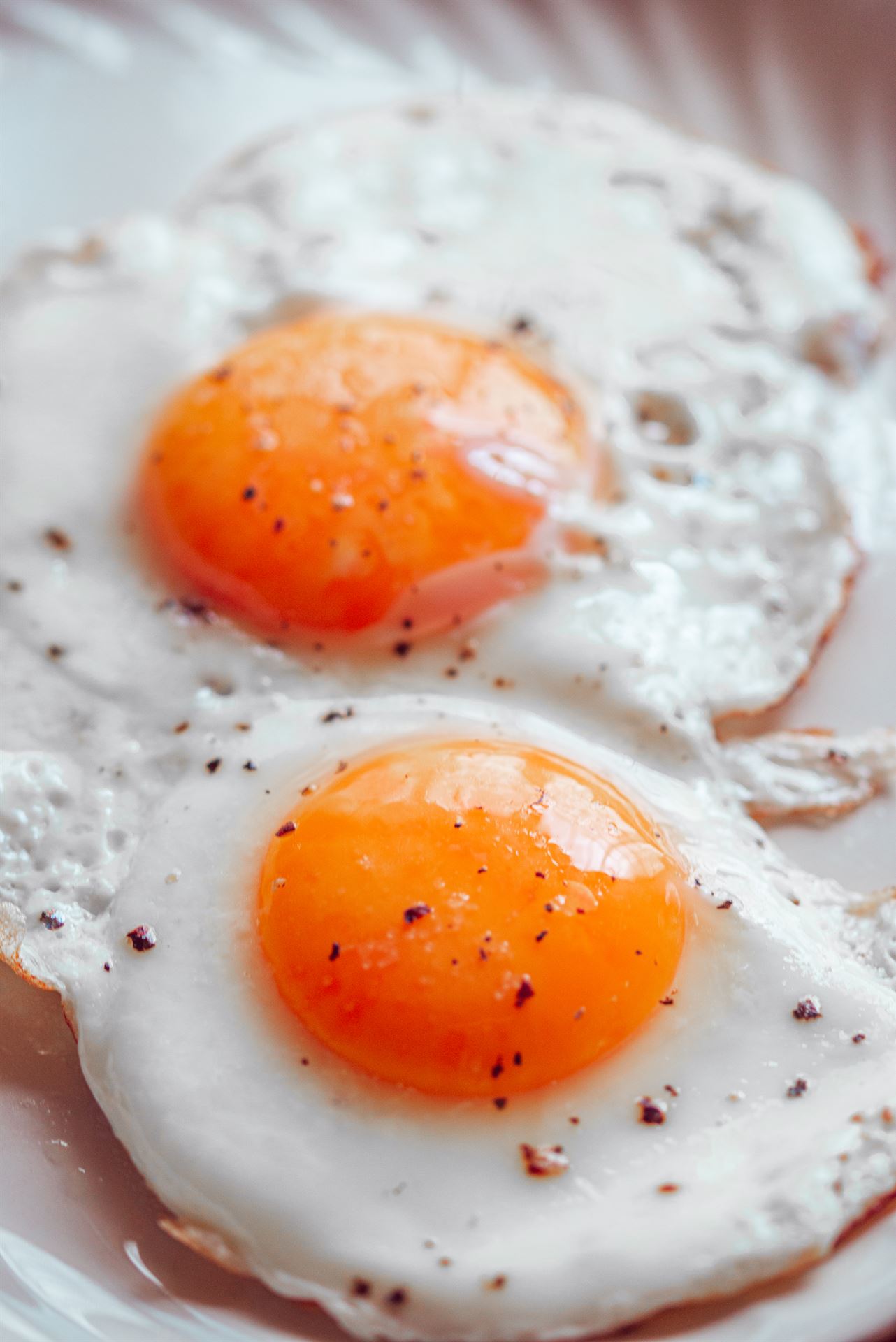 Sunny-side up eggs finished with Nutripepper